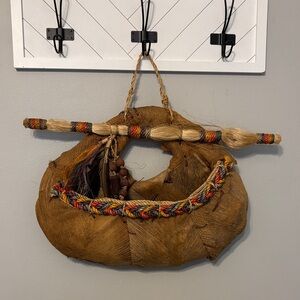 Native American palm frond leaf wall rope basket.